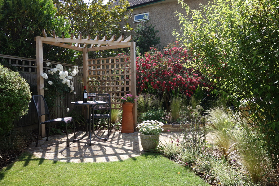 Planting designs with patio and pergola